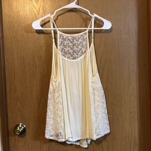 Lacey Tank With A Comfortable Flow & A Low Back!